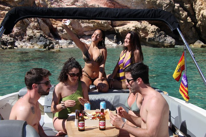 2.5 hour boat trip with snorkeling and paddle surfing in coves