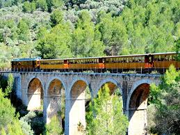 Historic Tren de Sóller wooden train at Sóller station platforms